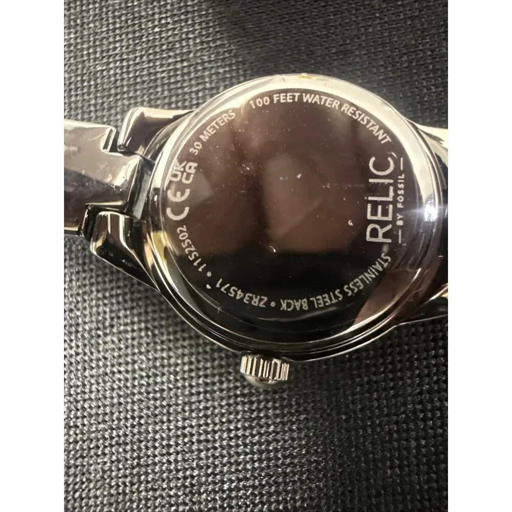 NEW RELIC BY FOSSIL ZR-34571 RUNNING PERFECTLY WITH TAGS STILL ON IT!! (B10)